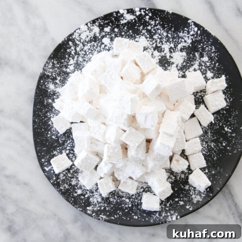 Close-up of fluffy vanilla bean marshmallows, showcasing their perfect texture and specks of real vanilla bean