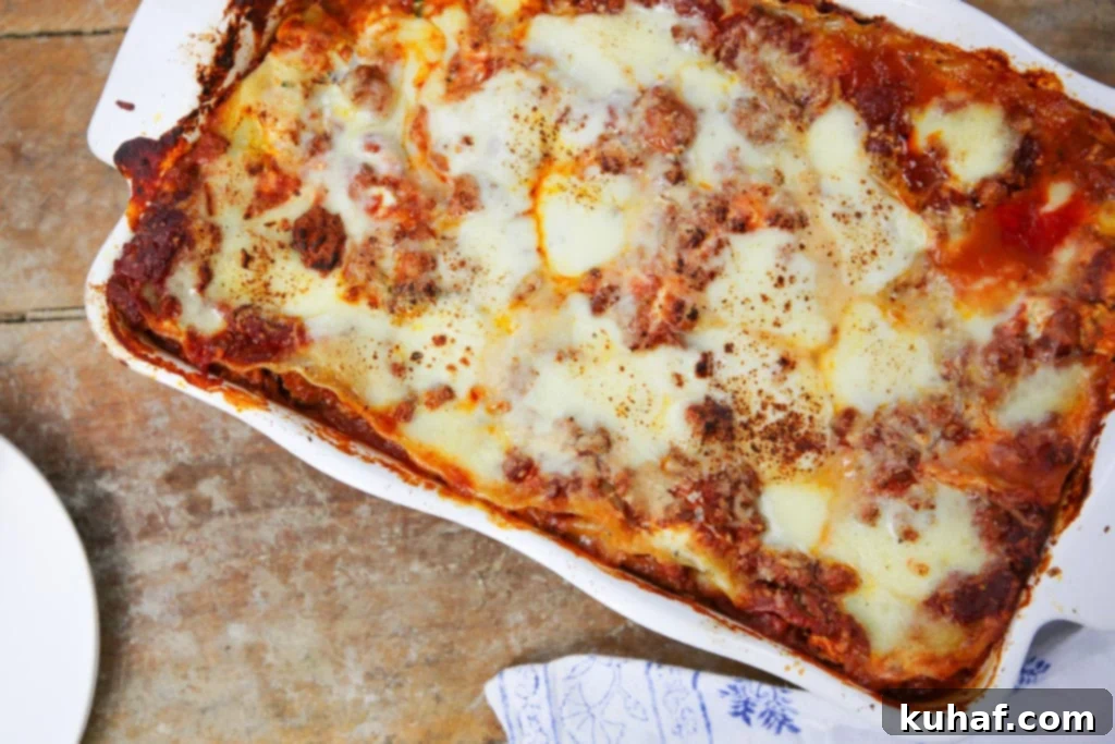 chef preparing ultimate lasagna with fresh ingredients