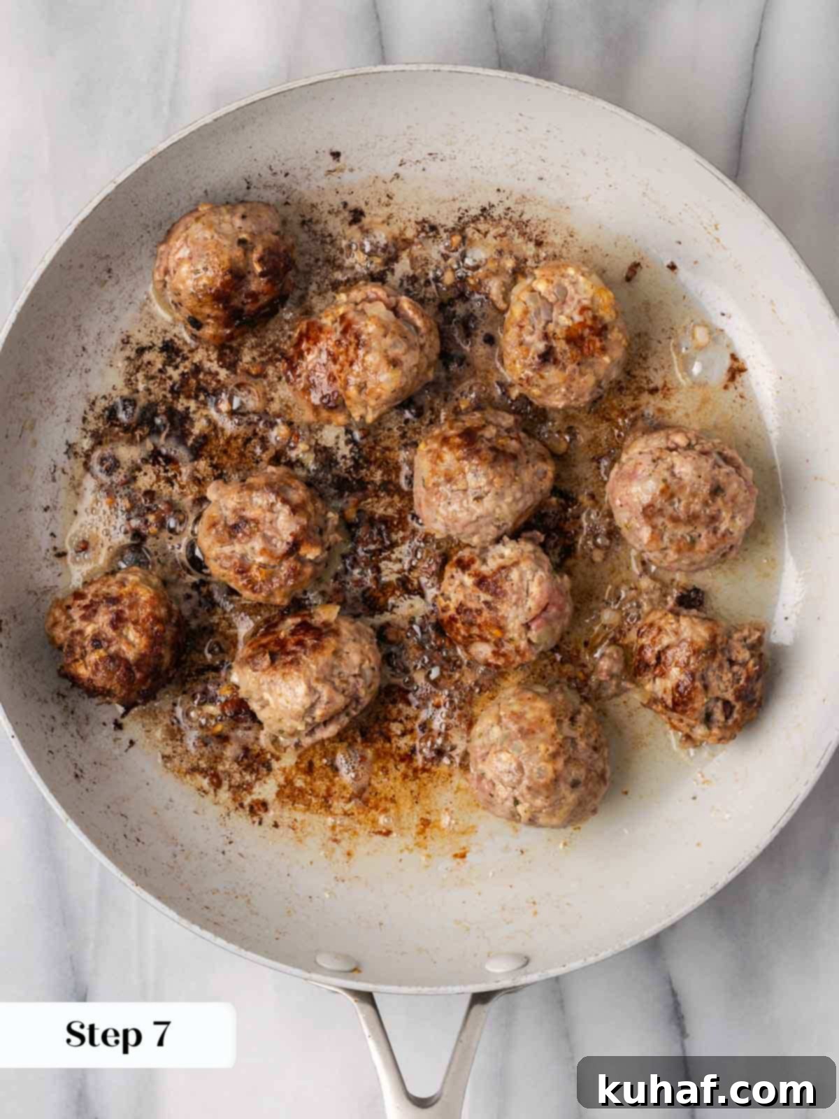 Fluffy Ricotta Meatballs 9 browning meatballs in pan.