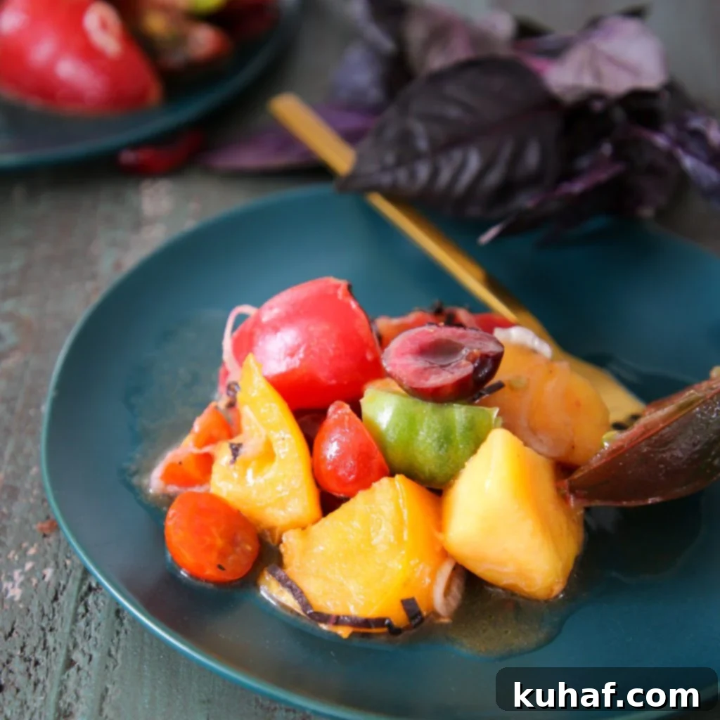 Vibrant Marinated Tomato Stone Fruit Salad, bursting with summer flavors