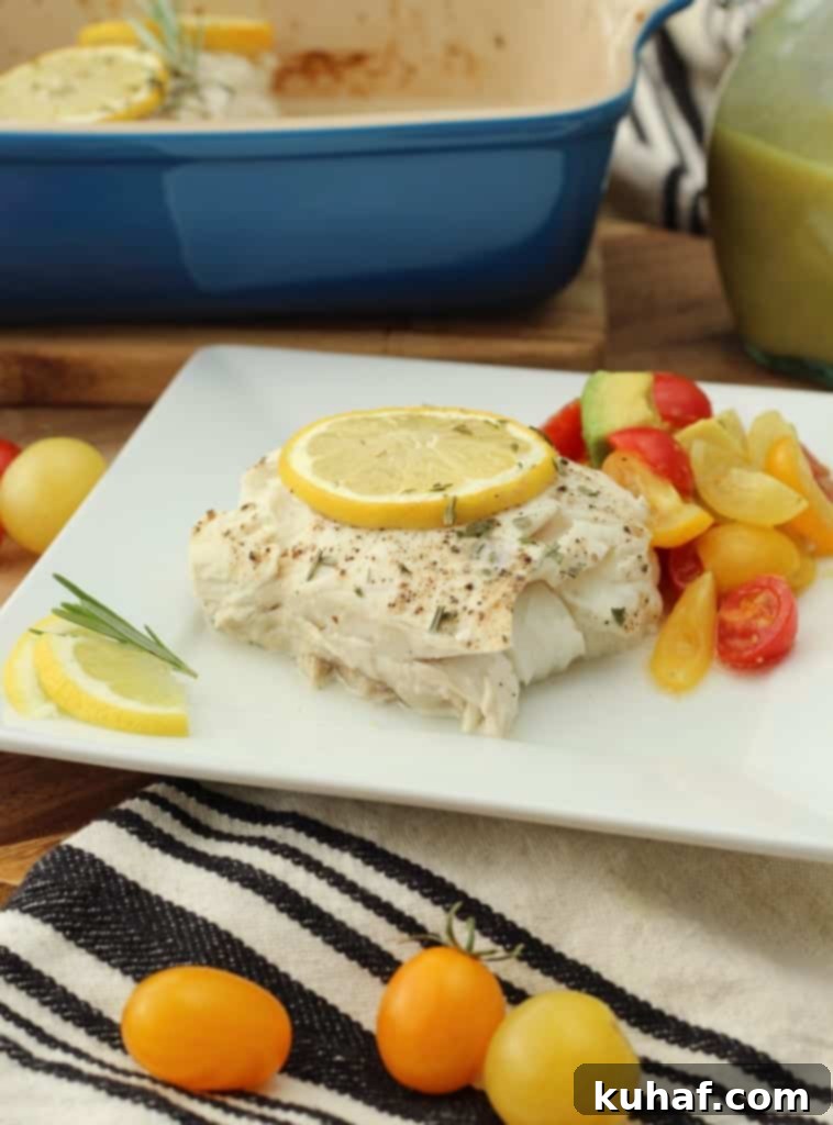 Flaky Baked Halibut with Bright Champagne Vinaigrette 10 A beautifully plated dish of baked halibut with lemon and rosemary