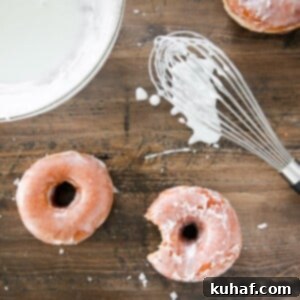 Irresistible Donut Glaze 5 Classic Donut Glaze with yeasted donuts on wood board.