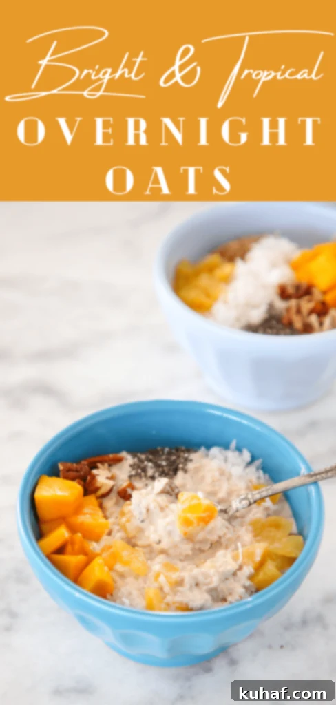 Tropical Overnight Oats with a spoon, ready to eat.