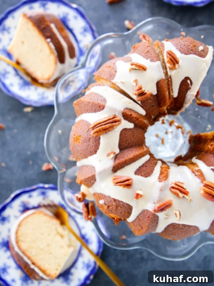 Maple Pound Cake with Maple Glaze served on an elegant cake stand