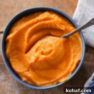 Maple-Kissed Sweet Potato Delight 5 Maple Mashed Sweet Potatoes in blue bowl