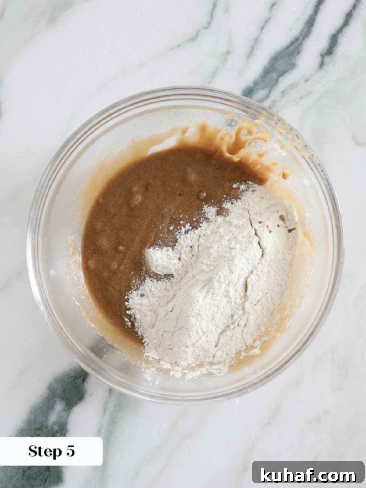 adding dry ingredients to butterscotch brownies.