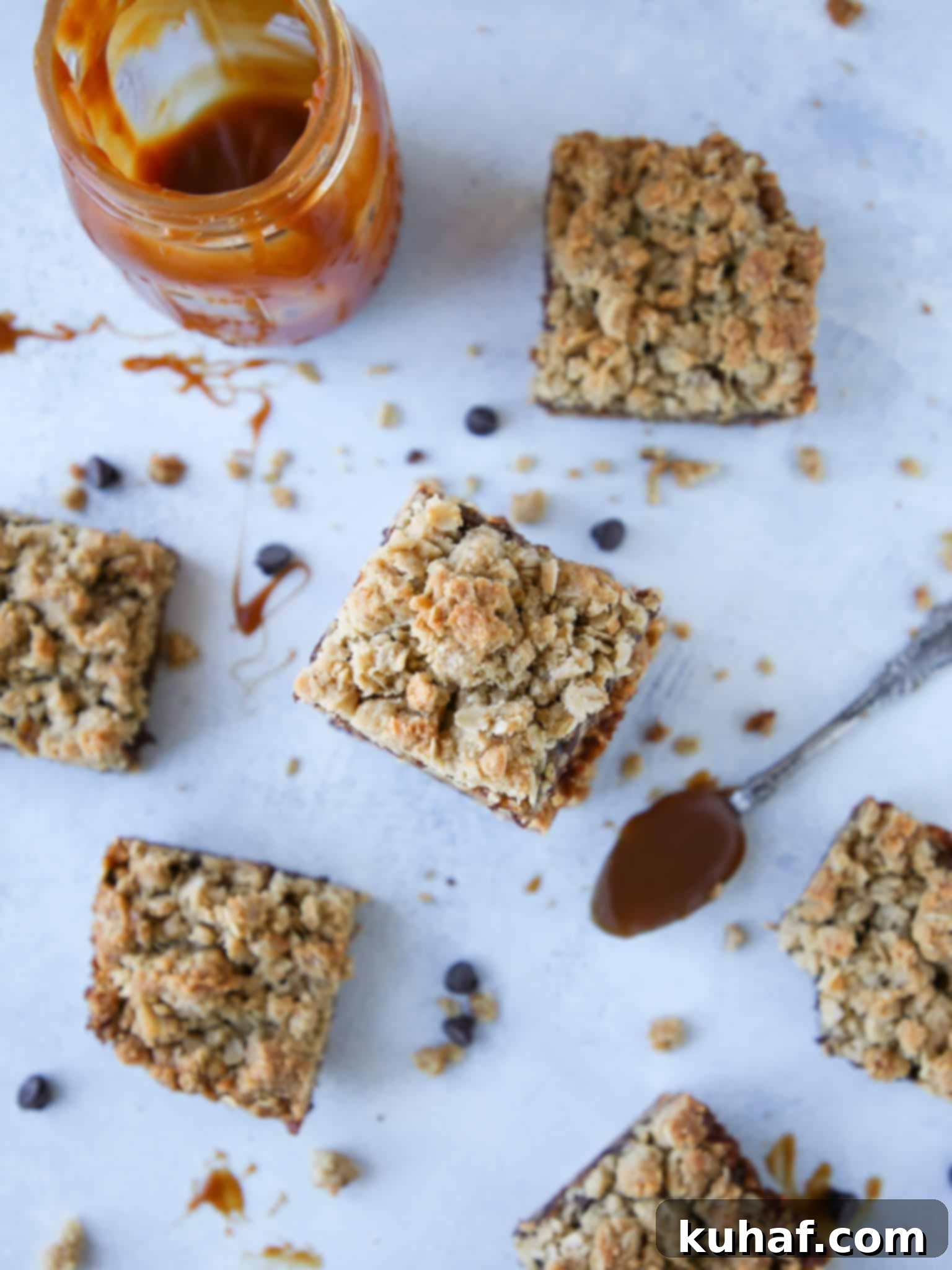 Caramelita Cookie Bars on blue surface with caramel