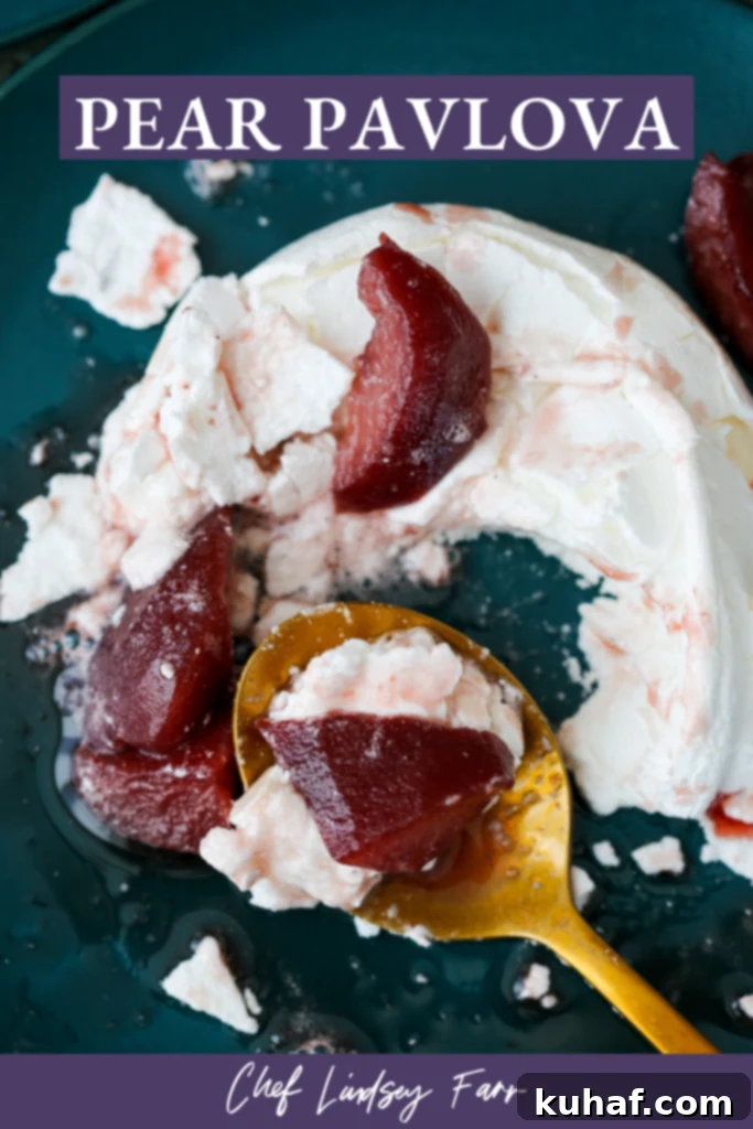 A top-down view of Poached Pear Pavlovas, showing the airy meringue peaks and the rich red wine sauce.