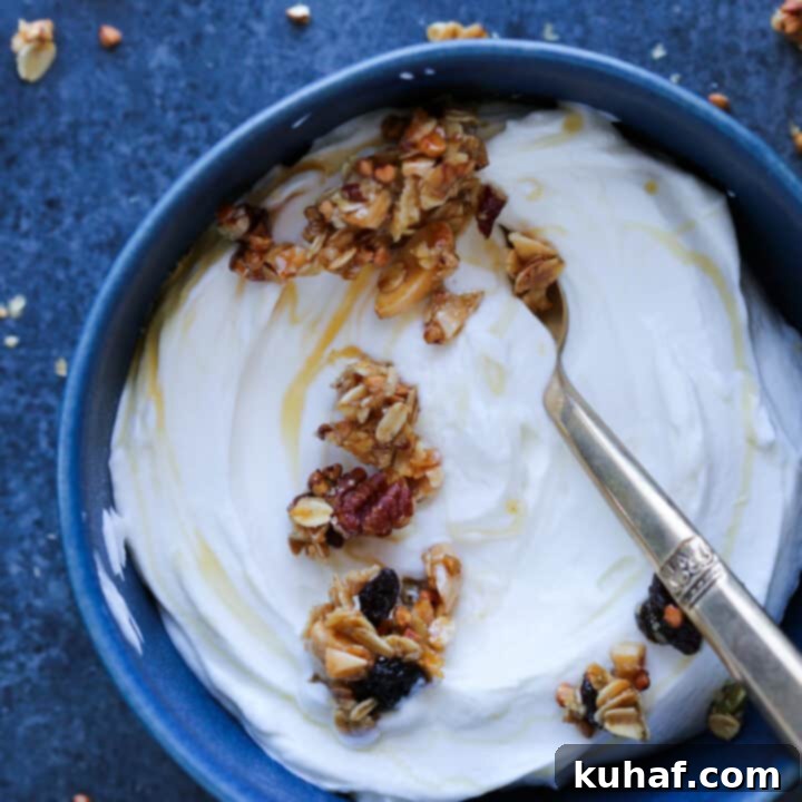 Honey Granola on yogurt in blue bowl