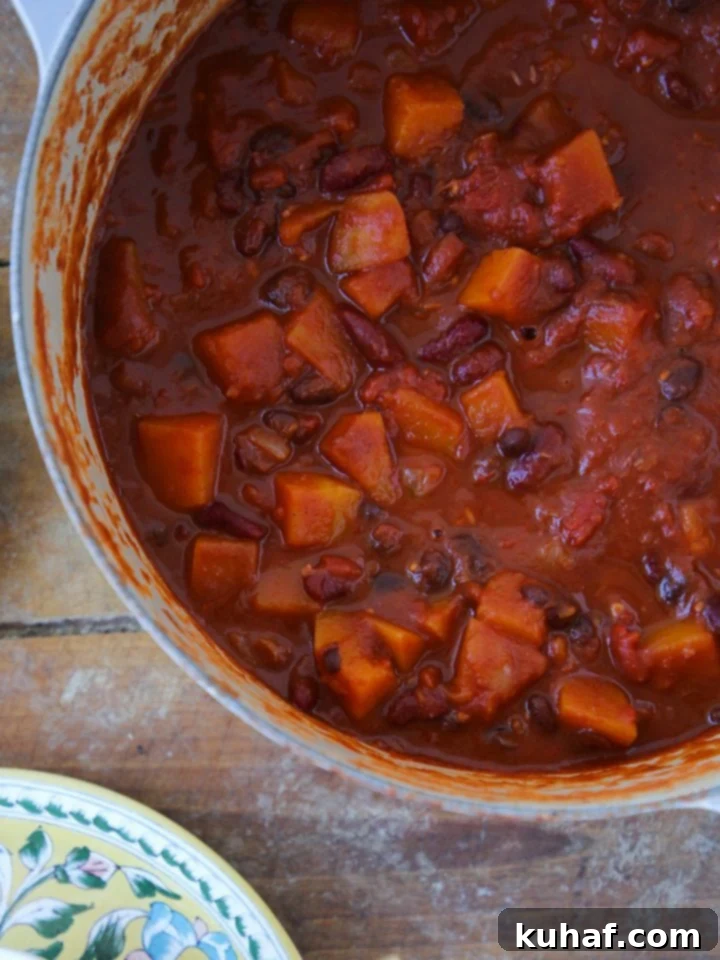 Vegan chili in a dutch oven, showcasing its rich texture and color.