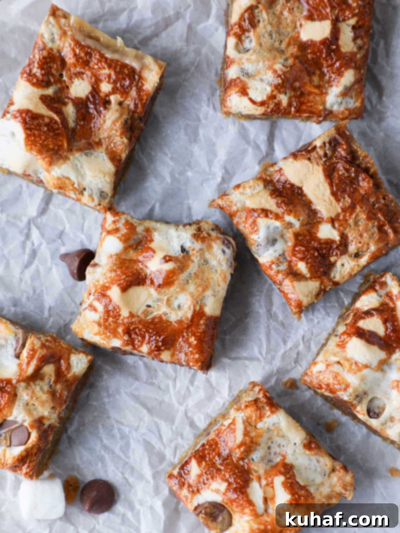 Ooey Gooey Smores Bars sliced on parchment