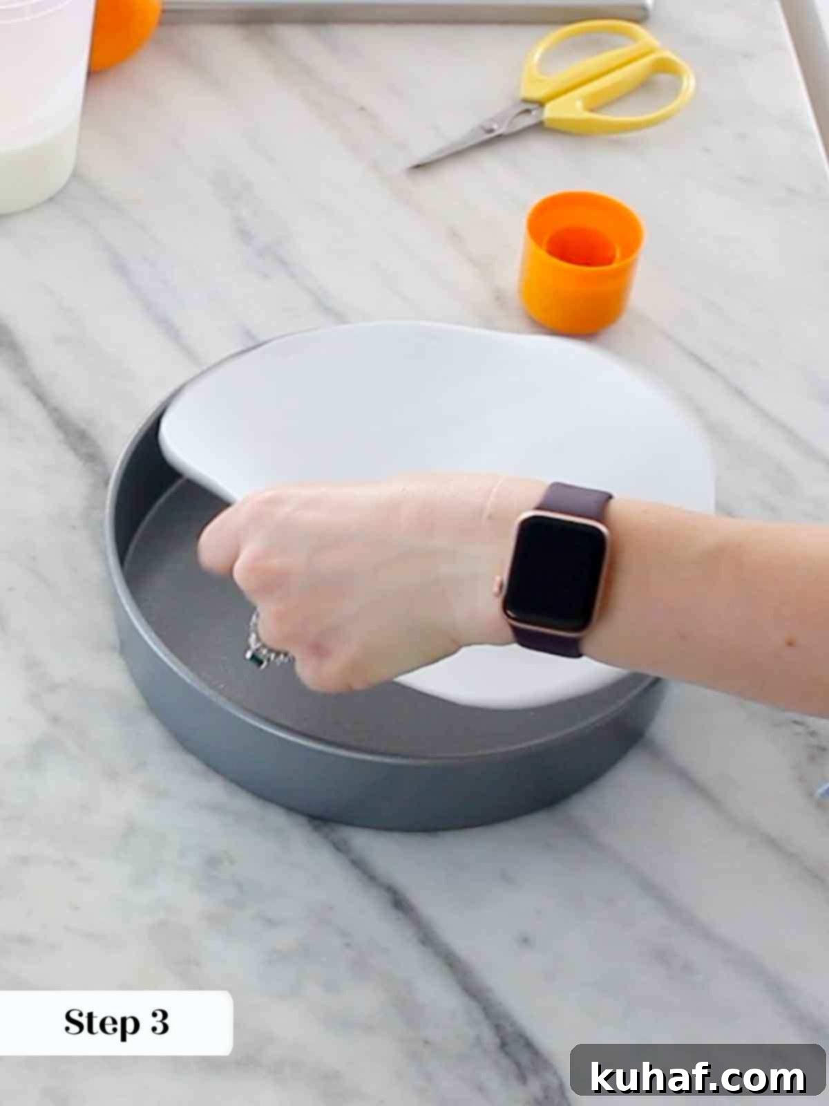 lining cake pan with parchment.