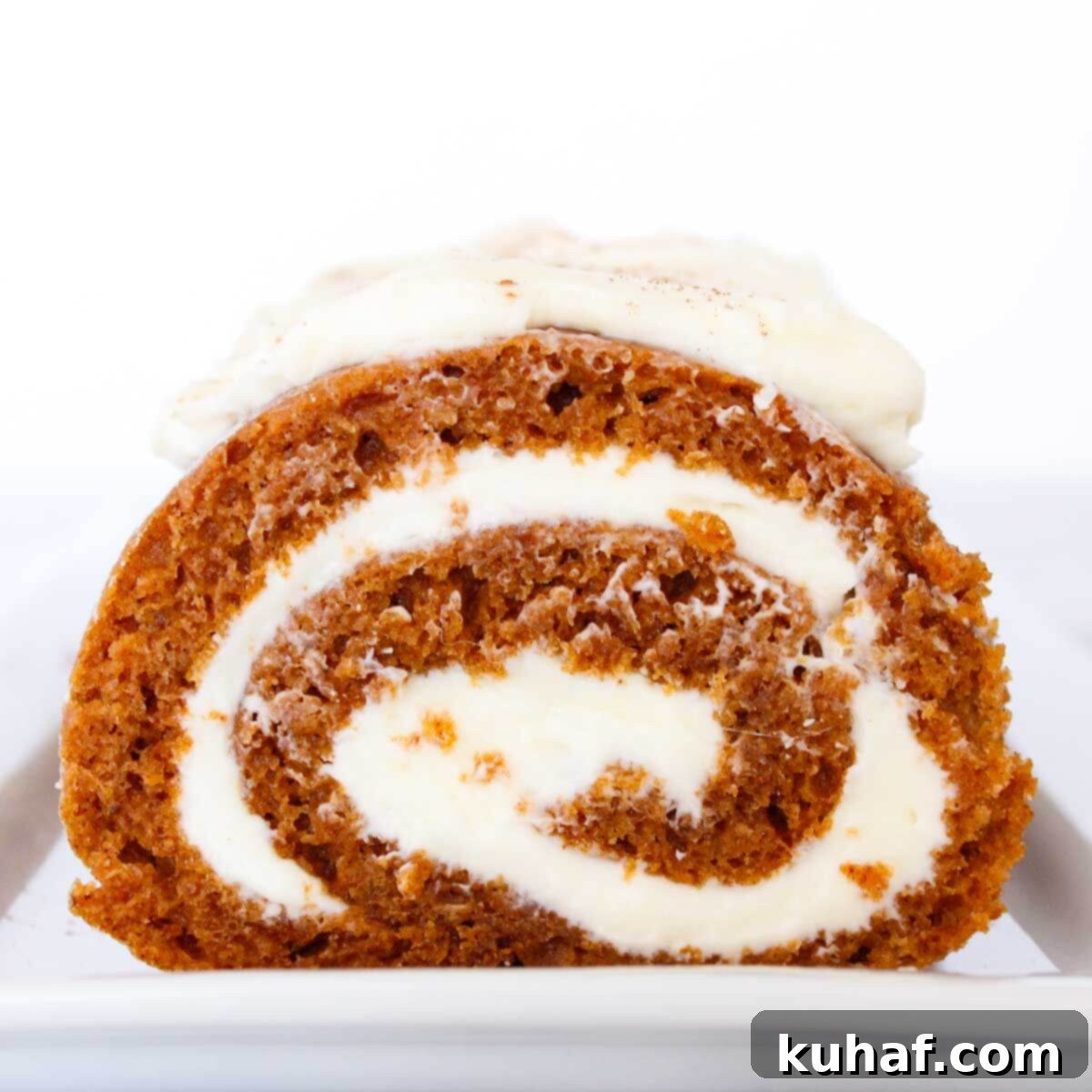 Irresistible Autumn Pumpkin Roll 4 sliced pumpkin roll cream cheese filling.
