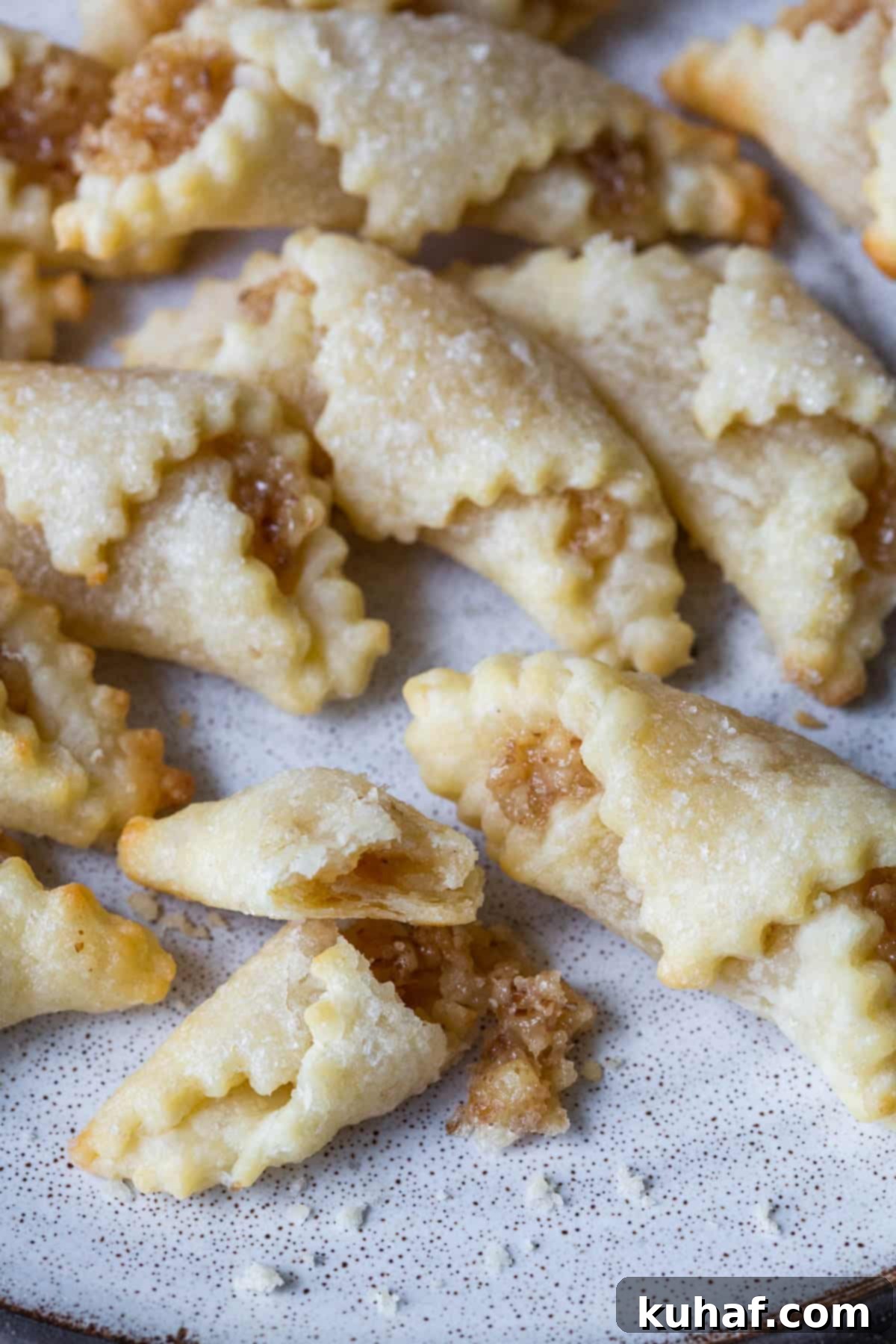 nut roll cookies broken open on plate.