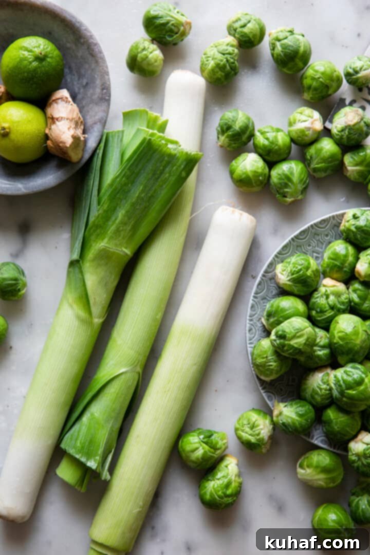 Brussels Sprouts and Leeks on grey surface