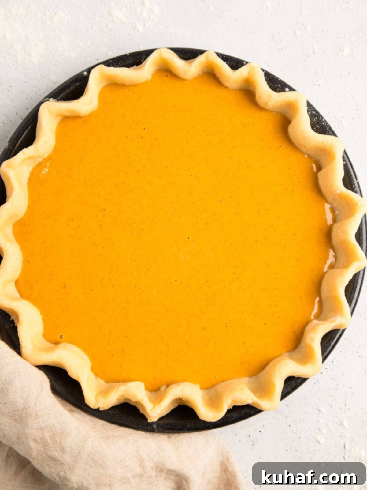 unbaked pumpkin pie in shell. 