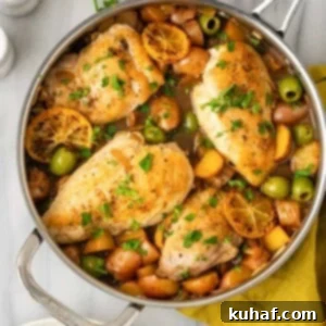 Bright and Tangy Lemon Chicken 13 Cooked lemon chicken before serving, showcasing its golden skin and rich sauce.