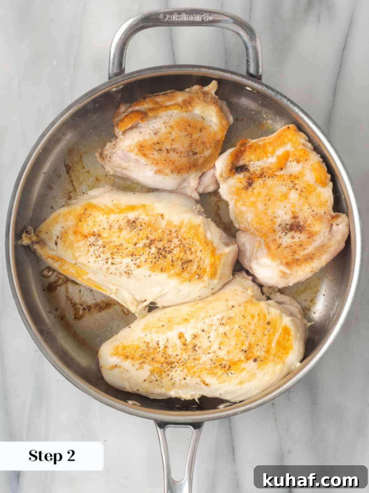 Bright and Tangy Lemon Chicken 5 Seared lemon chicken in a cast iron pan.