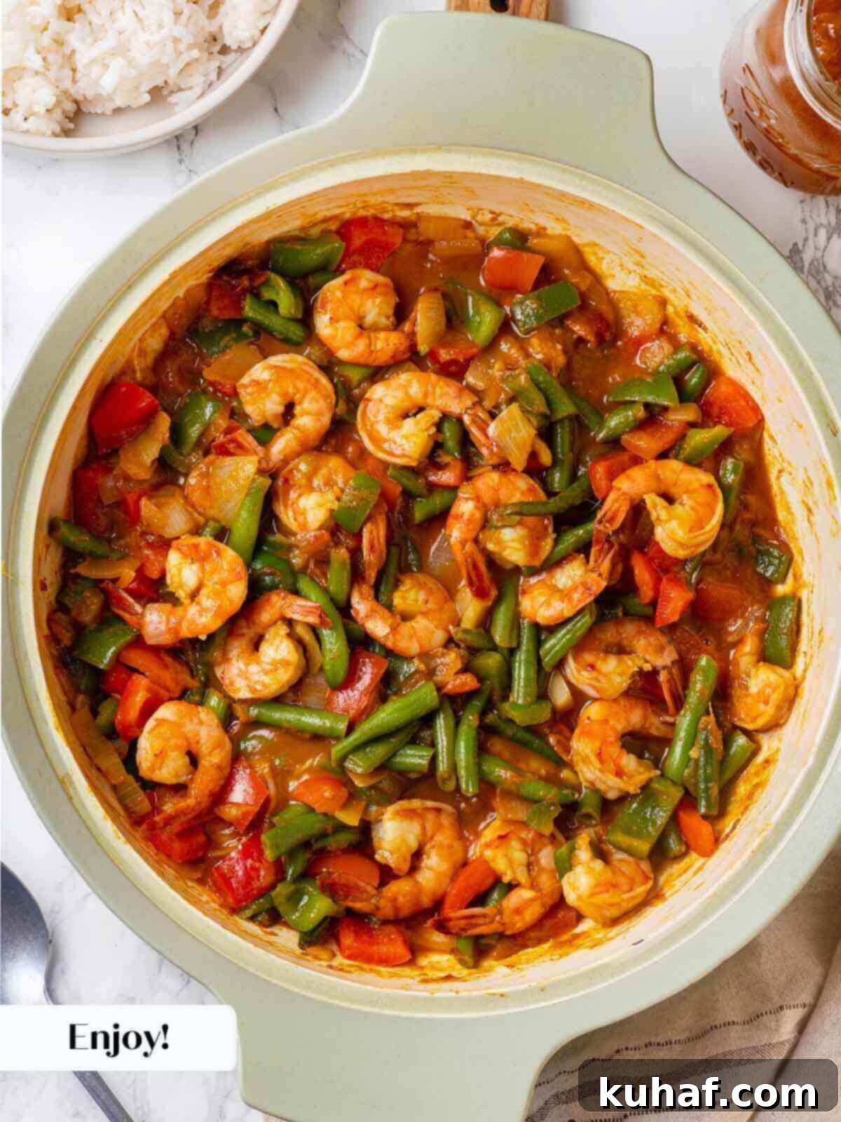 The fully prepared shrimp curry meal, beautifully presented and ready to be enjoyed.