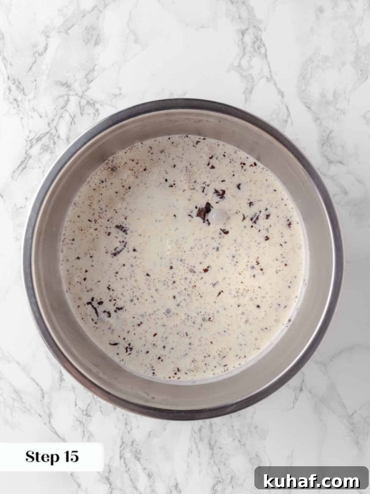 boiling heavy cream poured over chopped chocolate for fudge frosting.