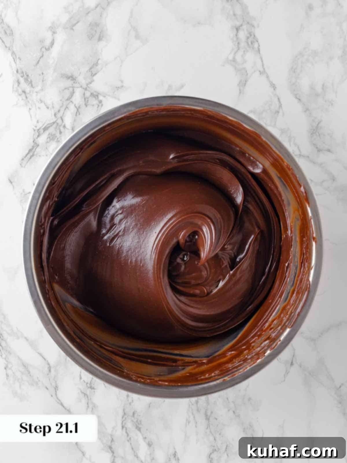 cooled and beautifully swirled caramel fudge frosting for guinness chocolate cake.