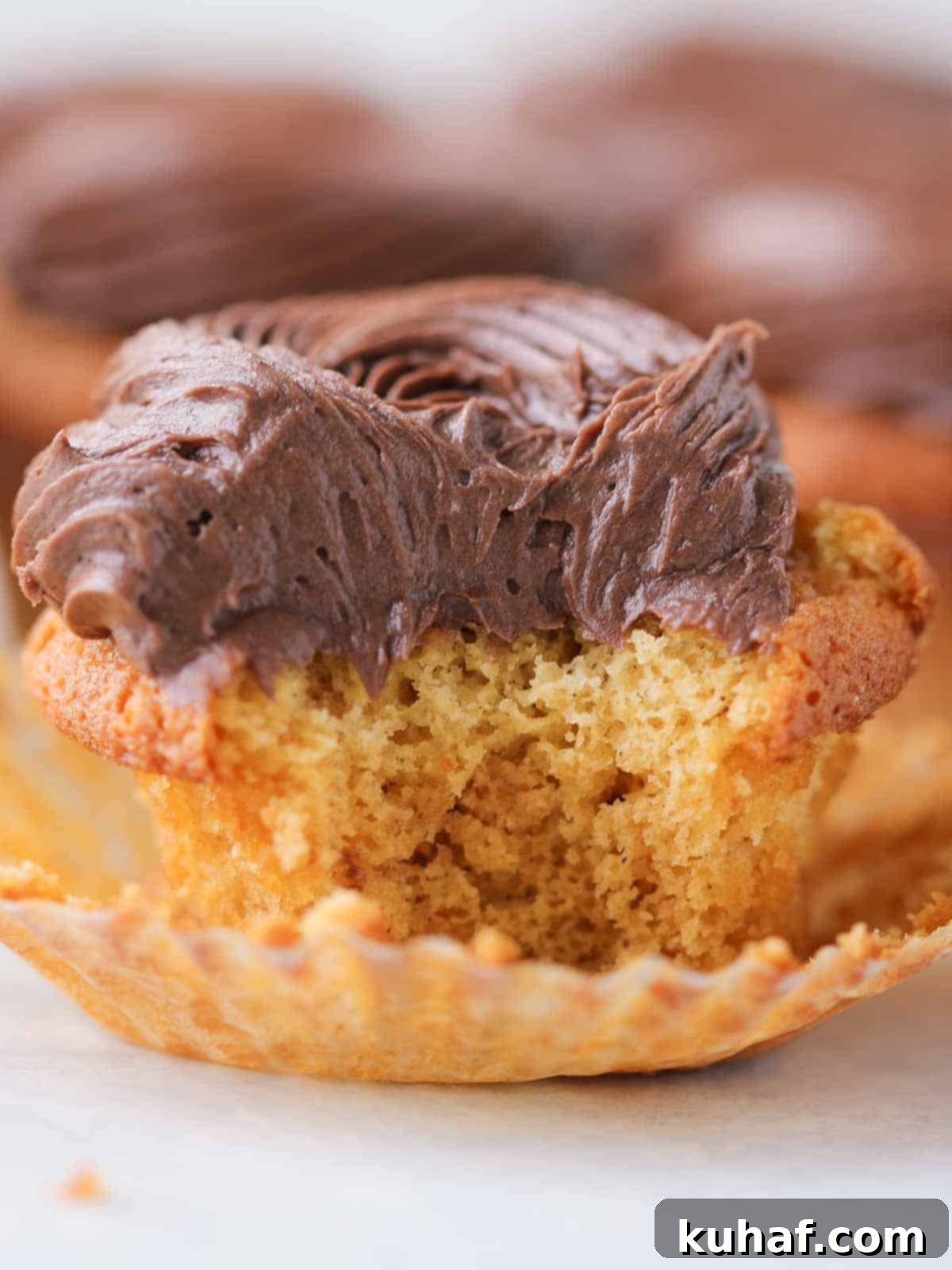 Decadent Chocolate Caramel Cupcakes 5 unwrapped caramel cupcake with chocolate buttercream.