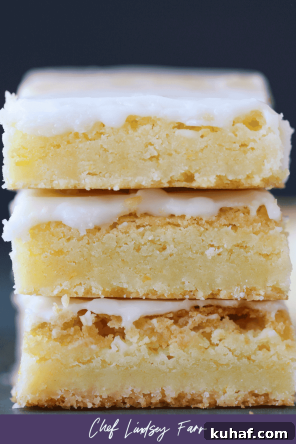 Lemon Blondies with a subtle purple border, emphasizing the vibrant dessert.