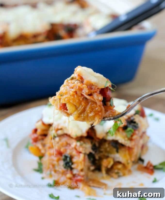 Spaghetti squash lasagna served on white plate.