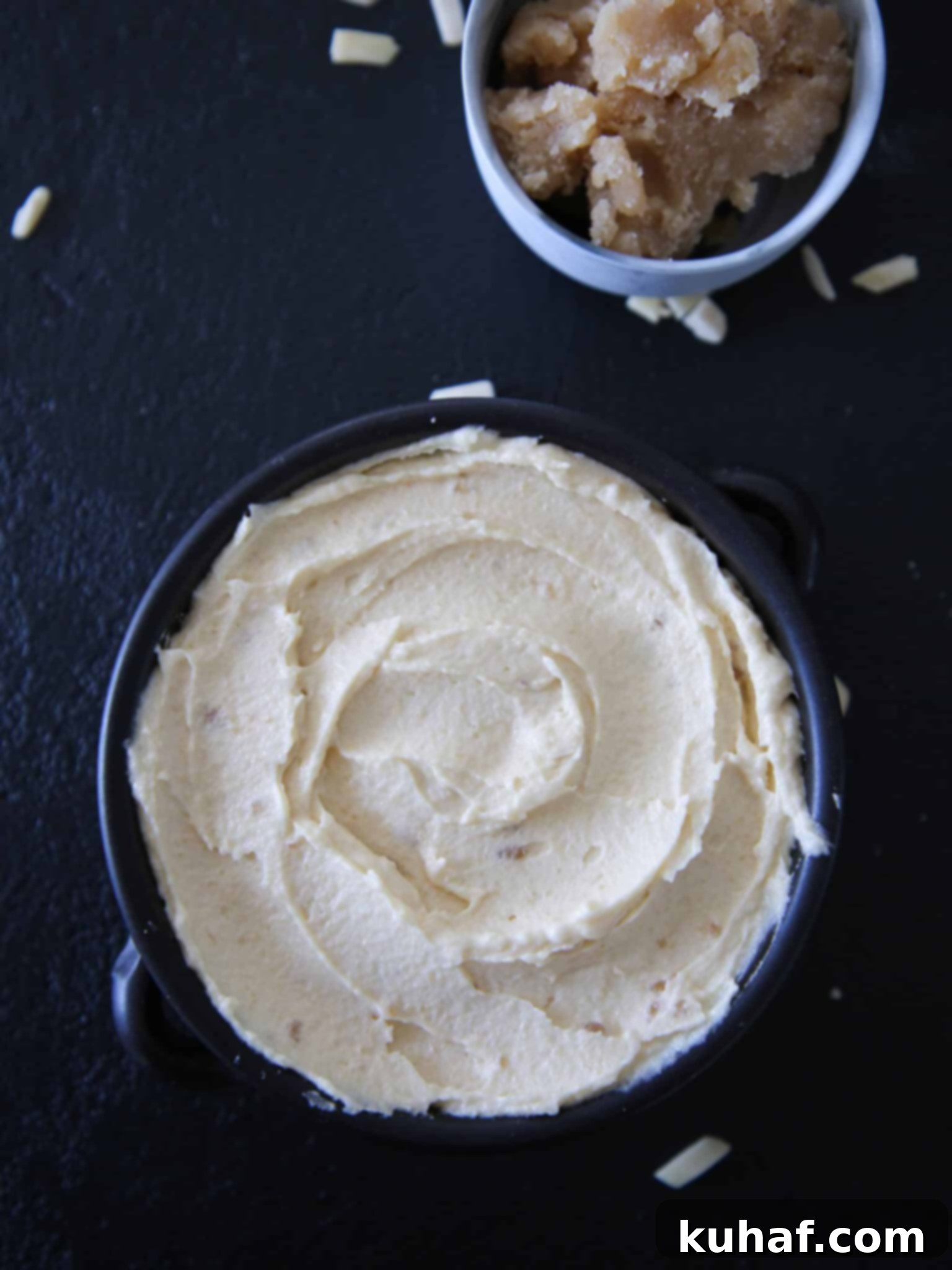 Almond Cream with Almond Paste, fresh and ready to be used in pastries, viewed from overhead on a light surface.