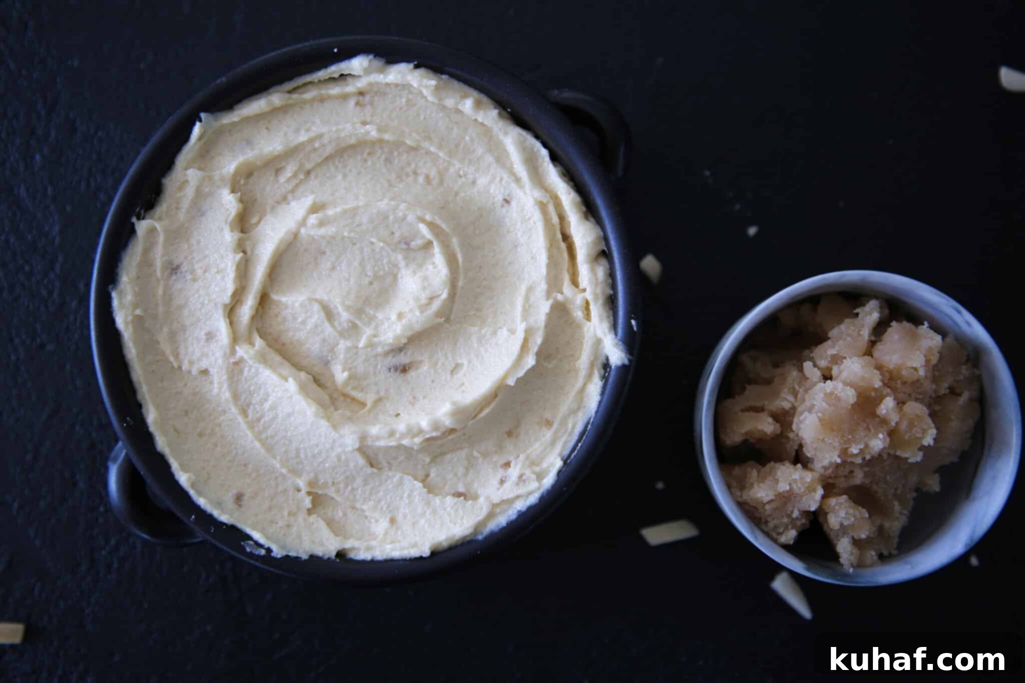 Baked Crème d’amande on a pastry in a tablescape setting, golden and puffed.