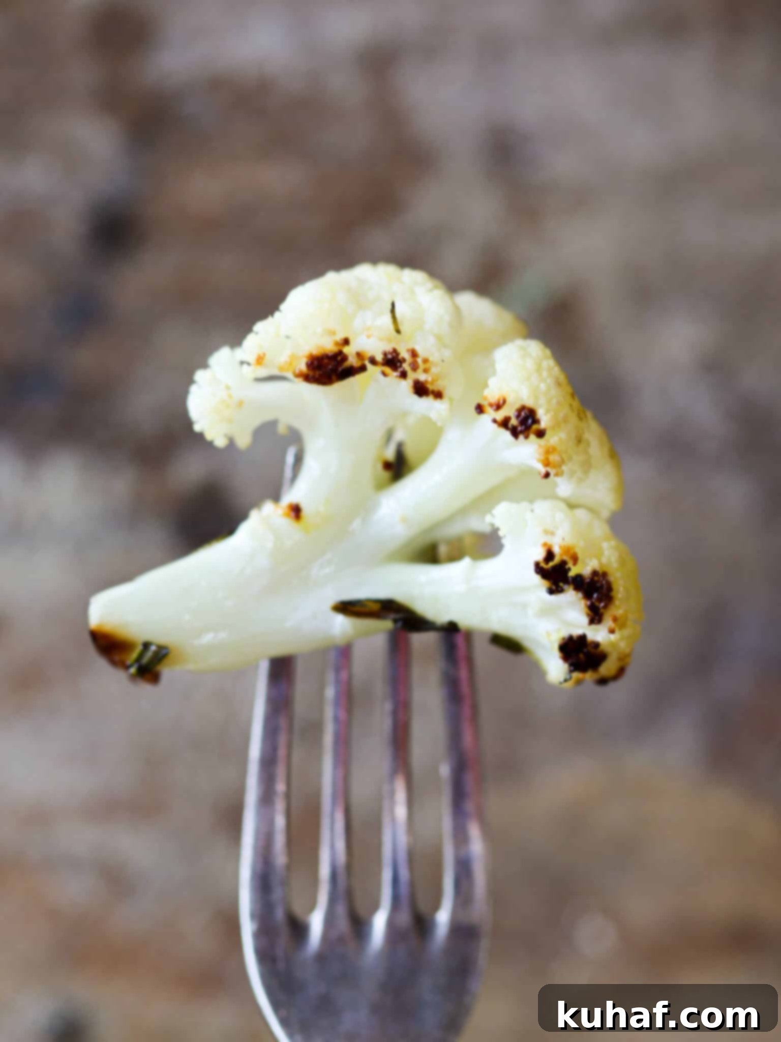 Easy Rosemary Lemon Roasted Cauliflower on fork