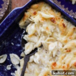White cheddar mac and cheese perfectly baked with a little golden brown around the edges.