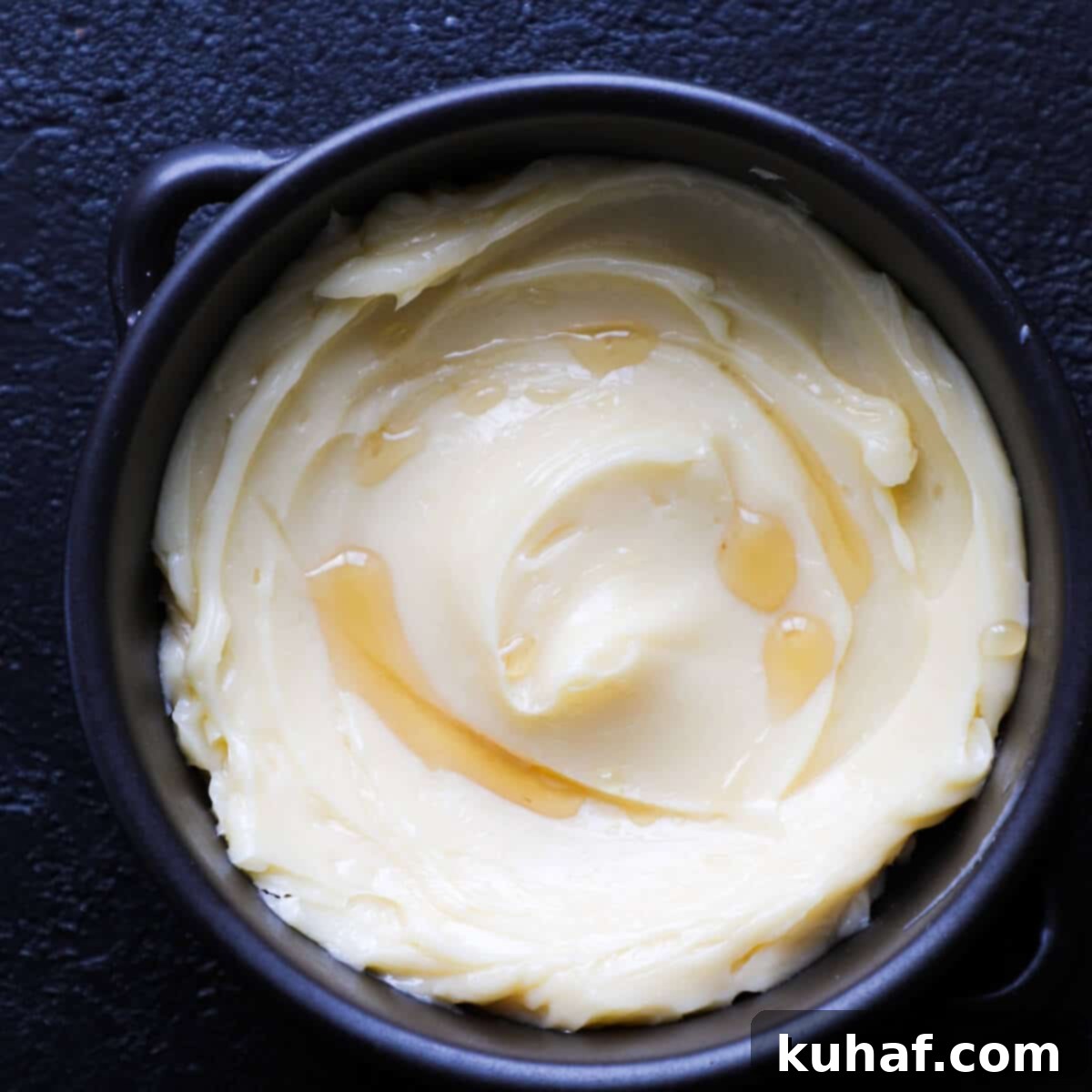 Artisan Maple Butter 6 A close-up of beautifully swirled Homemade Maple Butter, showing its smooth and creamy consistency, ready to be enjoyed.