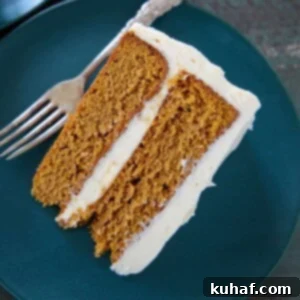 Pumpkin Spice Layer Cake slice on plate - showing distinct layers.