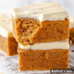 Close-up of the tender crumb of a pumpkin bar - showcasing the perfect texture.