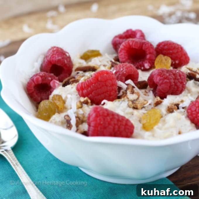 Bircher Muesli in a clear glass jar, showing layers of oats, apple, and toppings.