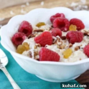 Bircher Müesli - A close up of creamy overnight oats with berries and pecans.