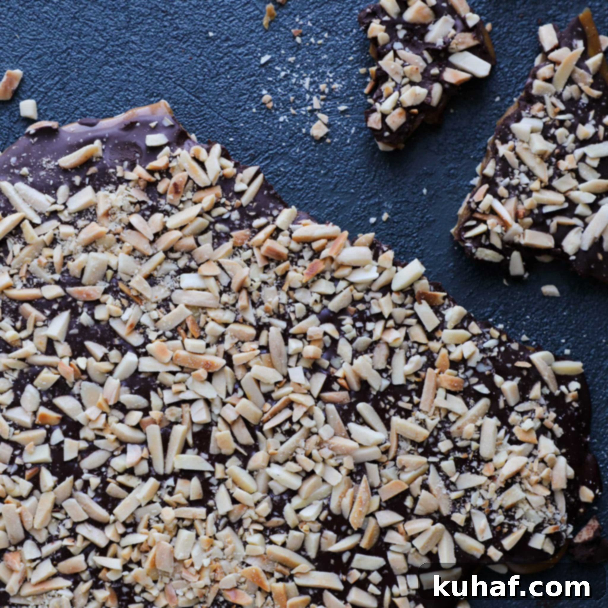 Homemade toffee pieces arranged on a blue background