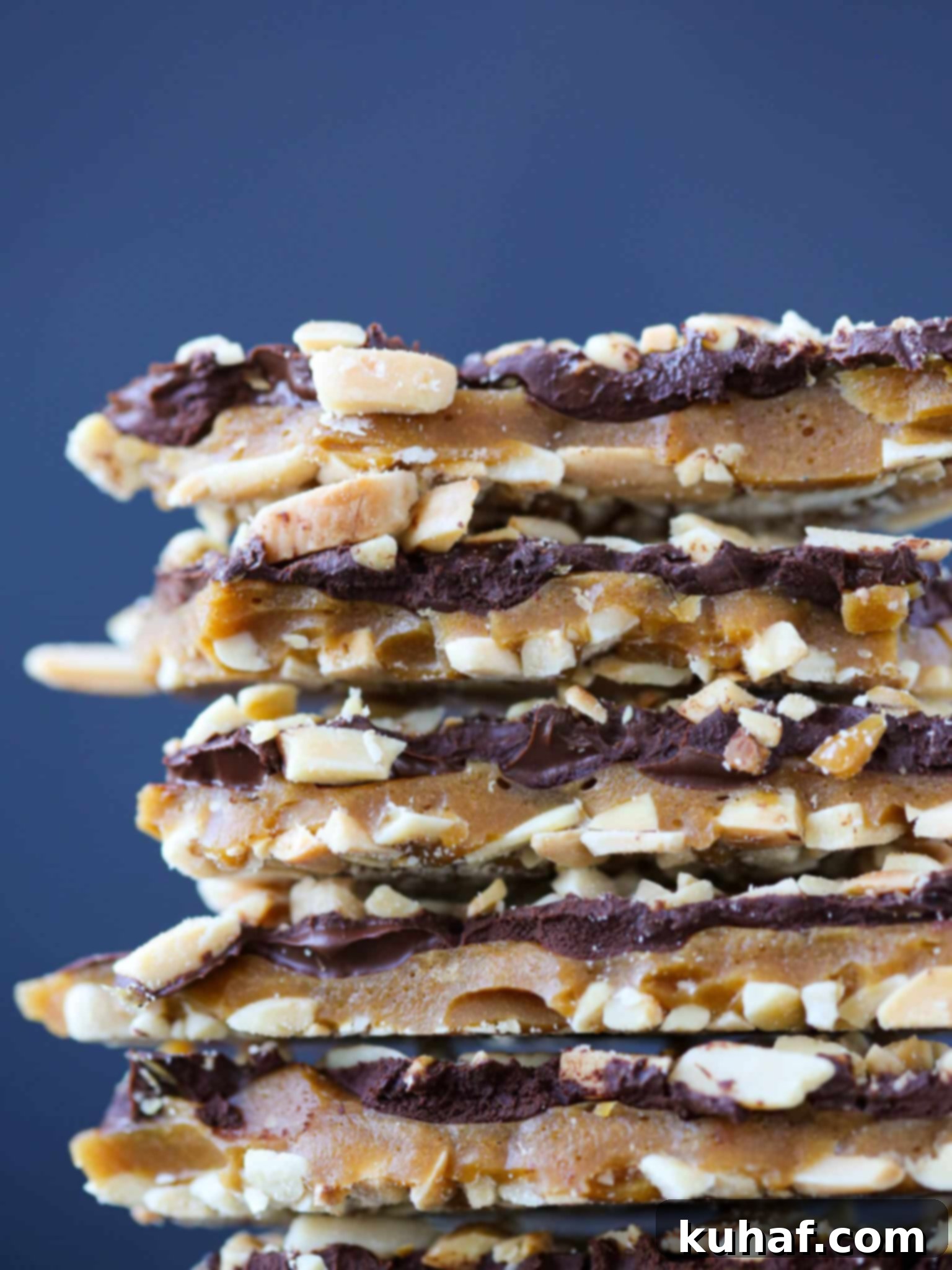 Ingredients for making homemade toffee, including almonds, butter, sugar, and chocolate