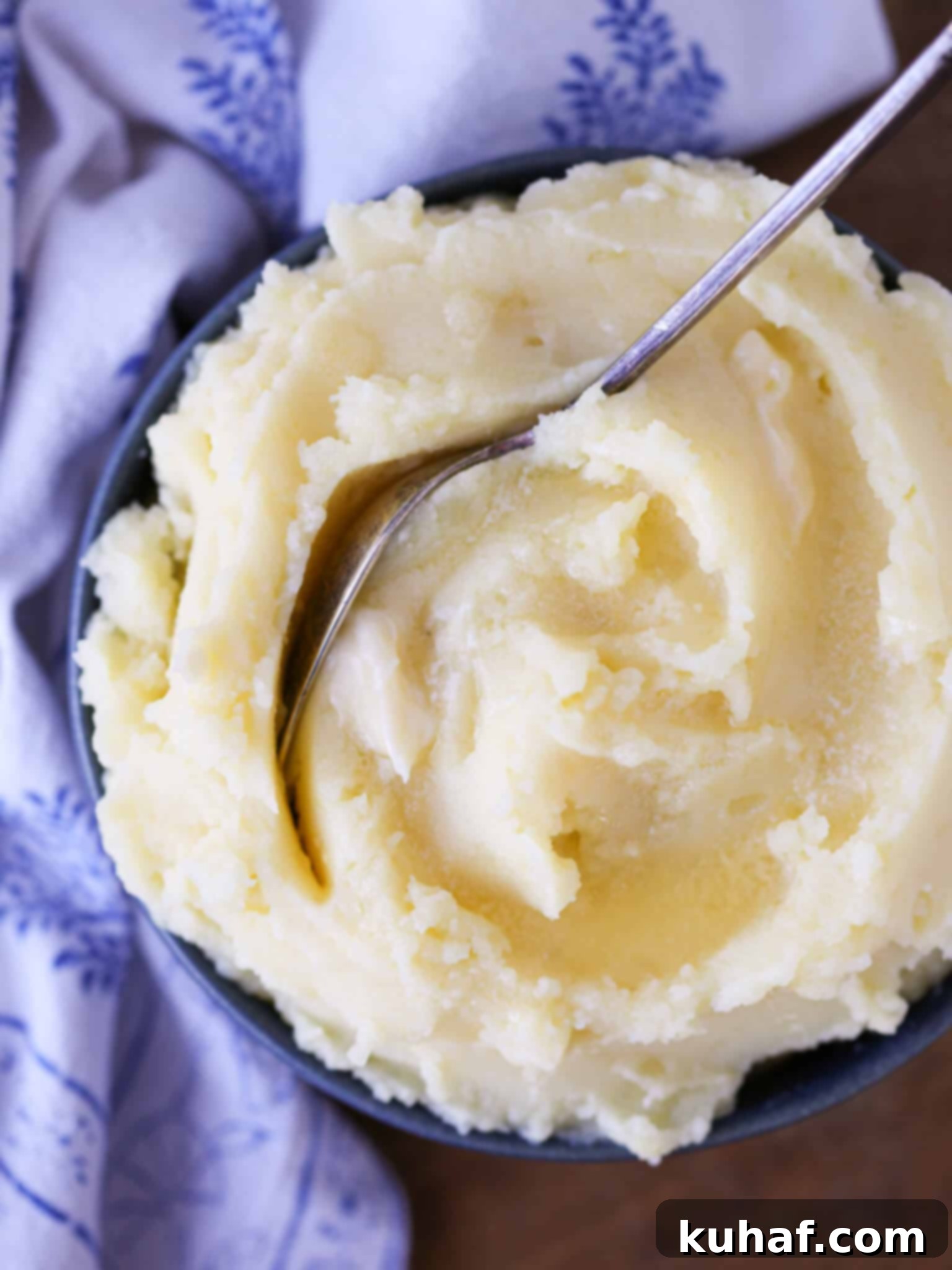 Creamy Mashed Potatoes Recipe with melted butter, a must-have among the 35 best Thanksgiving side dishes.