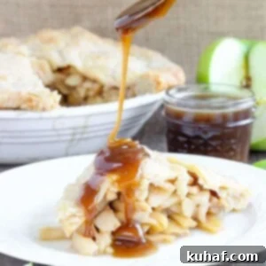 This Butterscotch Apple Pie is an absolute heavenly dessert! It features lightly spiced apples baked inside a flaky all-butter crust, complemented by a luscious homemade brown sugar butterscotch sauce, creating an irresistible treat.