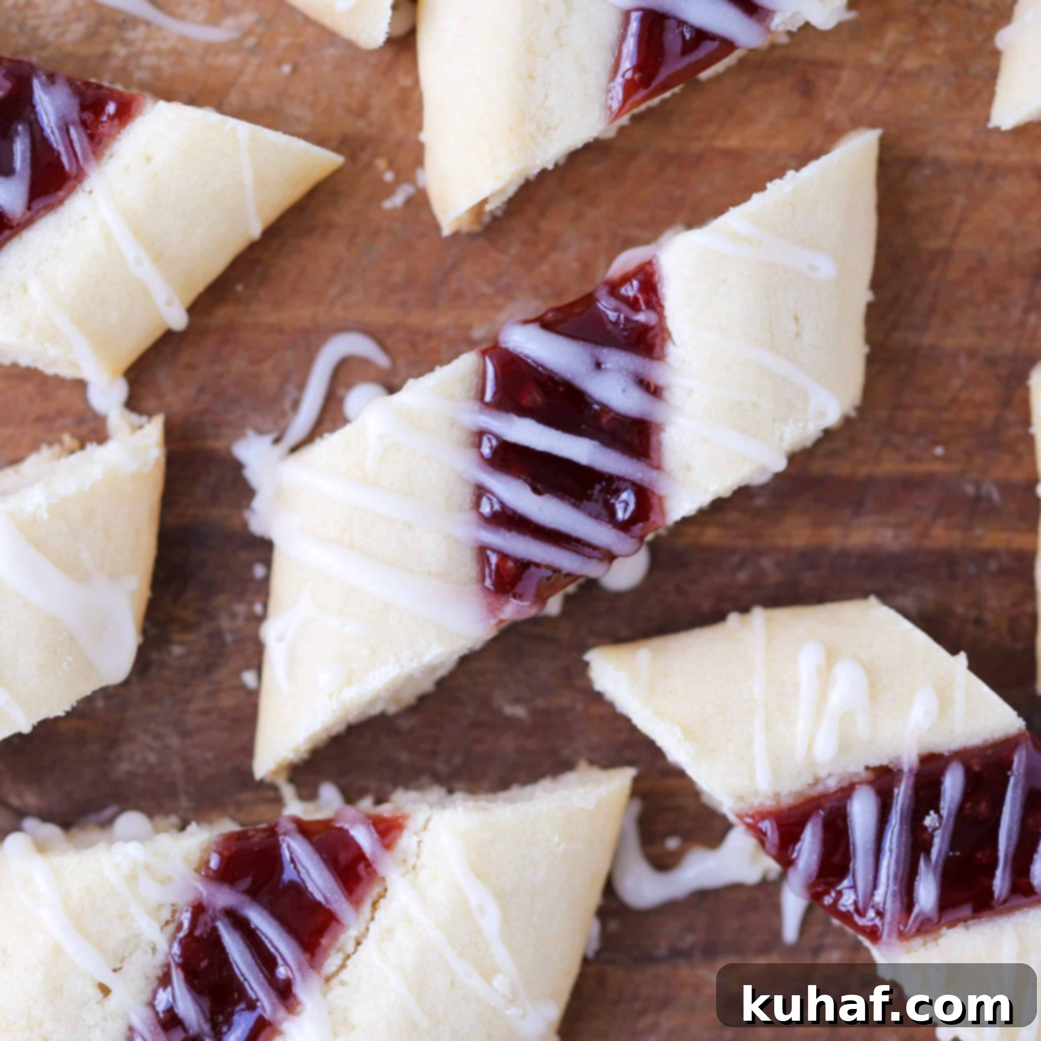 Elegant Raspberry Ribbon Cookies 5 Danish Christmas Jam Cookies Prepared - Baked cookie ropes with jam, ready for slicing.