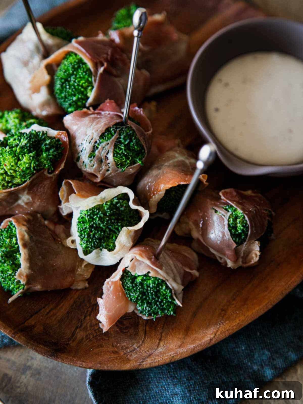 bright green broccoli wrapped in prosciutto.