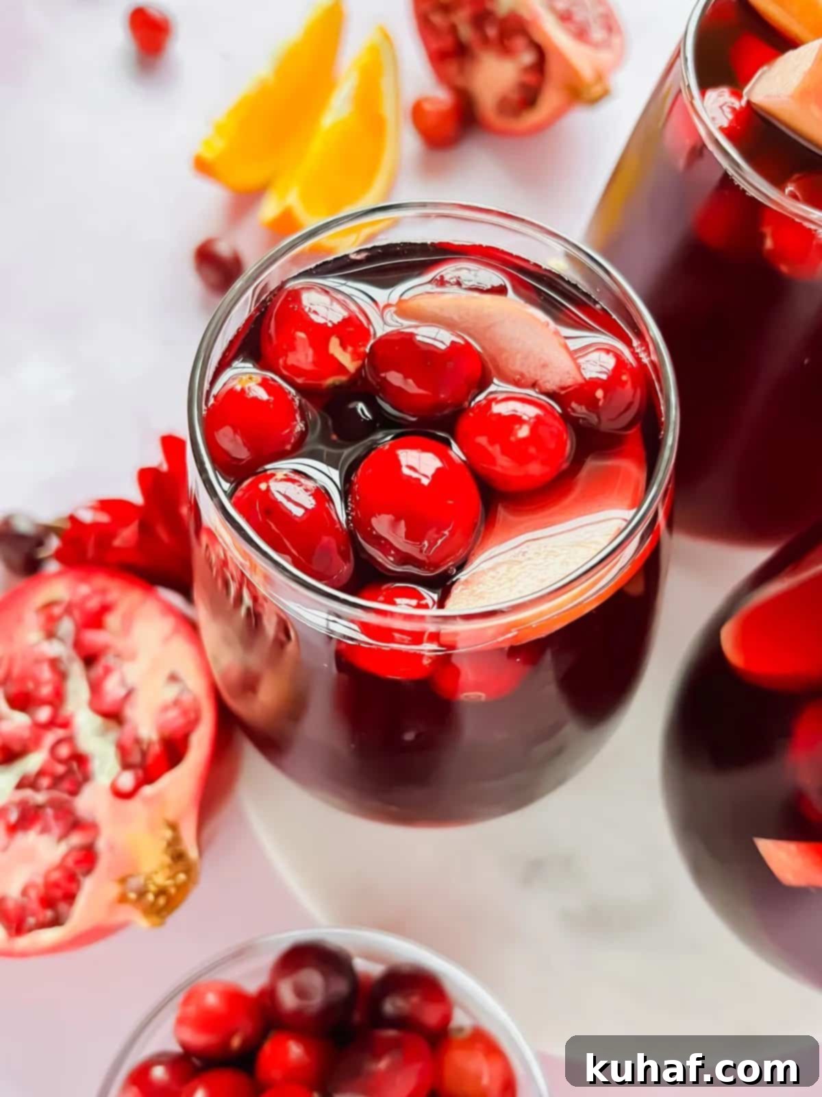 pomegranate cranberry sangria bright red in glass.