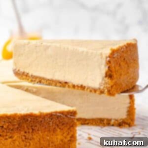 a slice of pumpkin no bake cheesecake on a server.