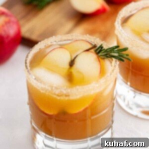 a harvest apple ginger smash with rosemary garnish.