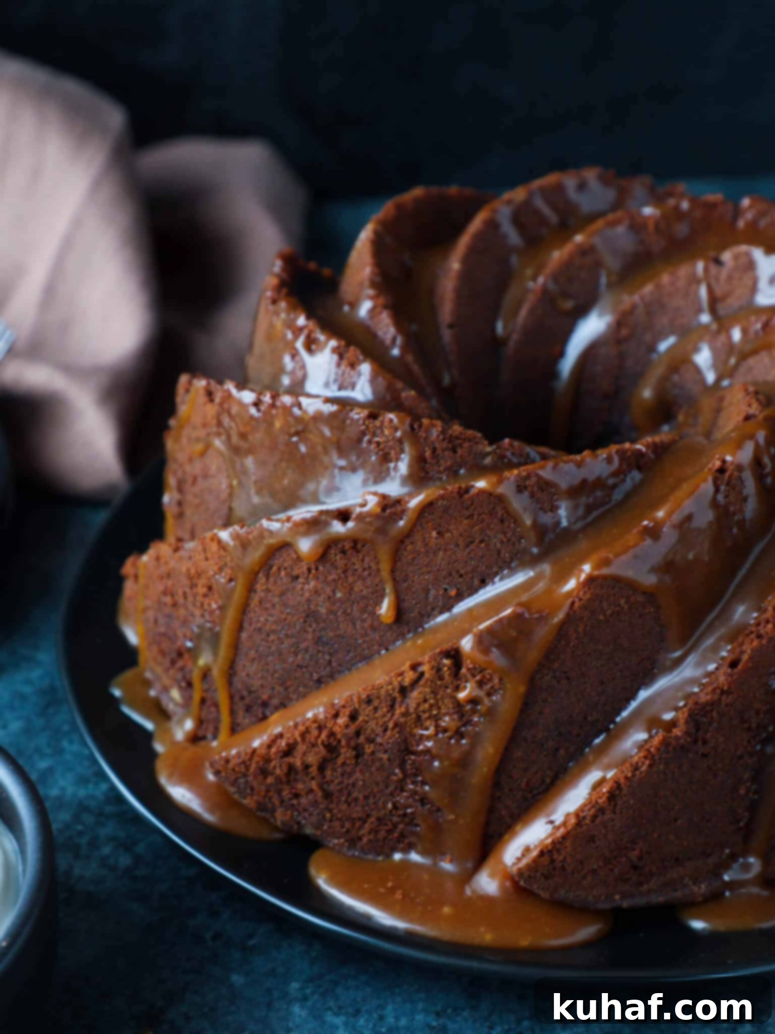 Caramel Molasses Pound Cake Glazed - A slice of pound cake beautifully glazed with caramel sauce.