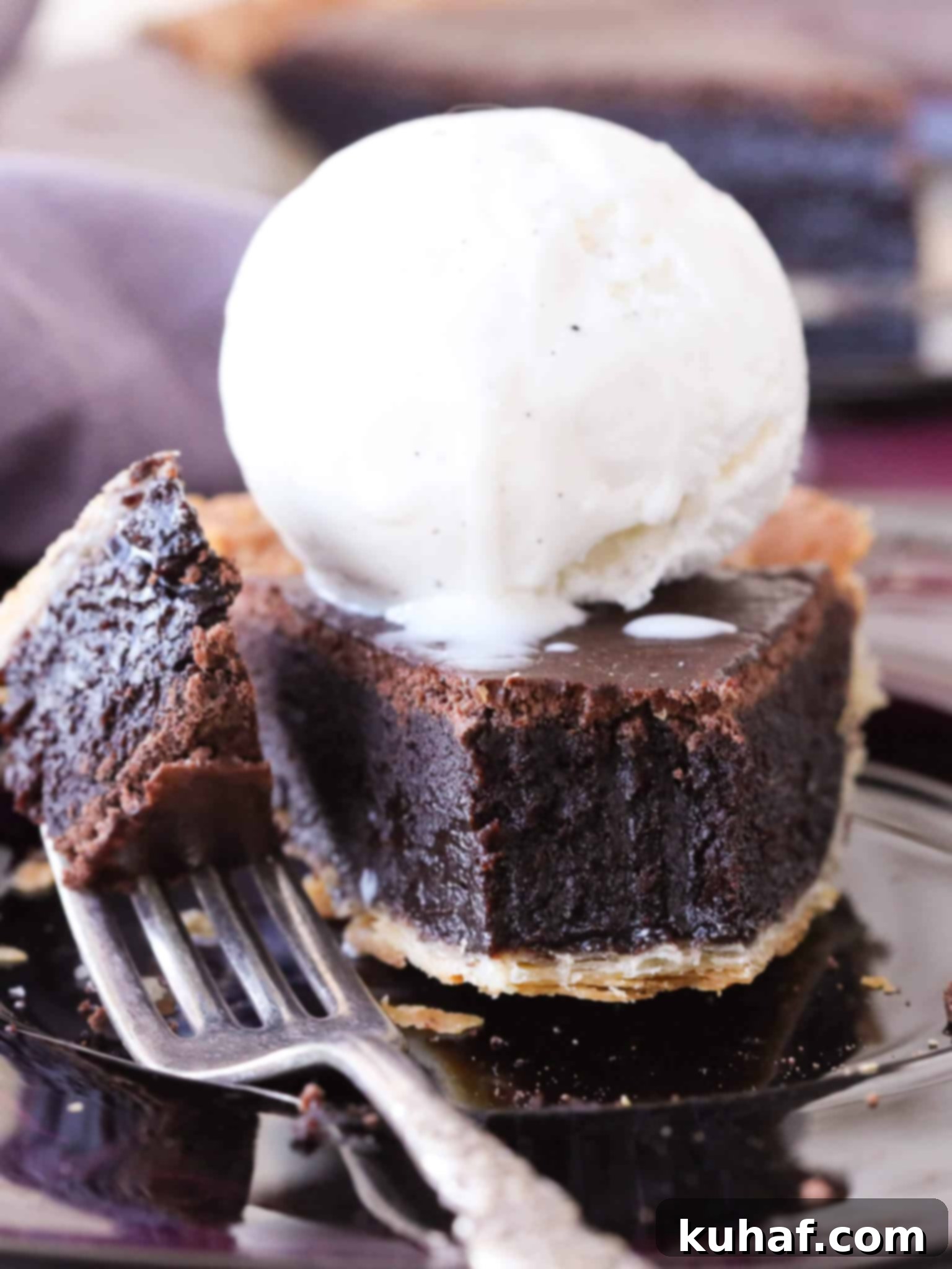 Slice of easy chocolate pie with a perfect fudgy texture.