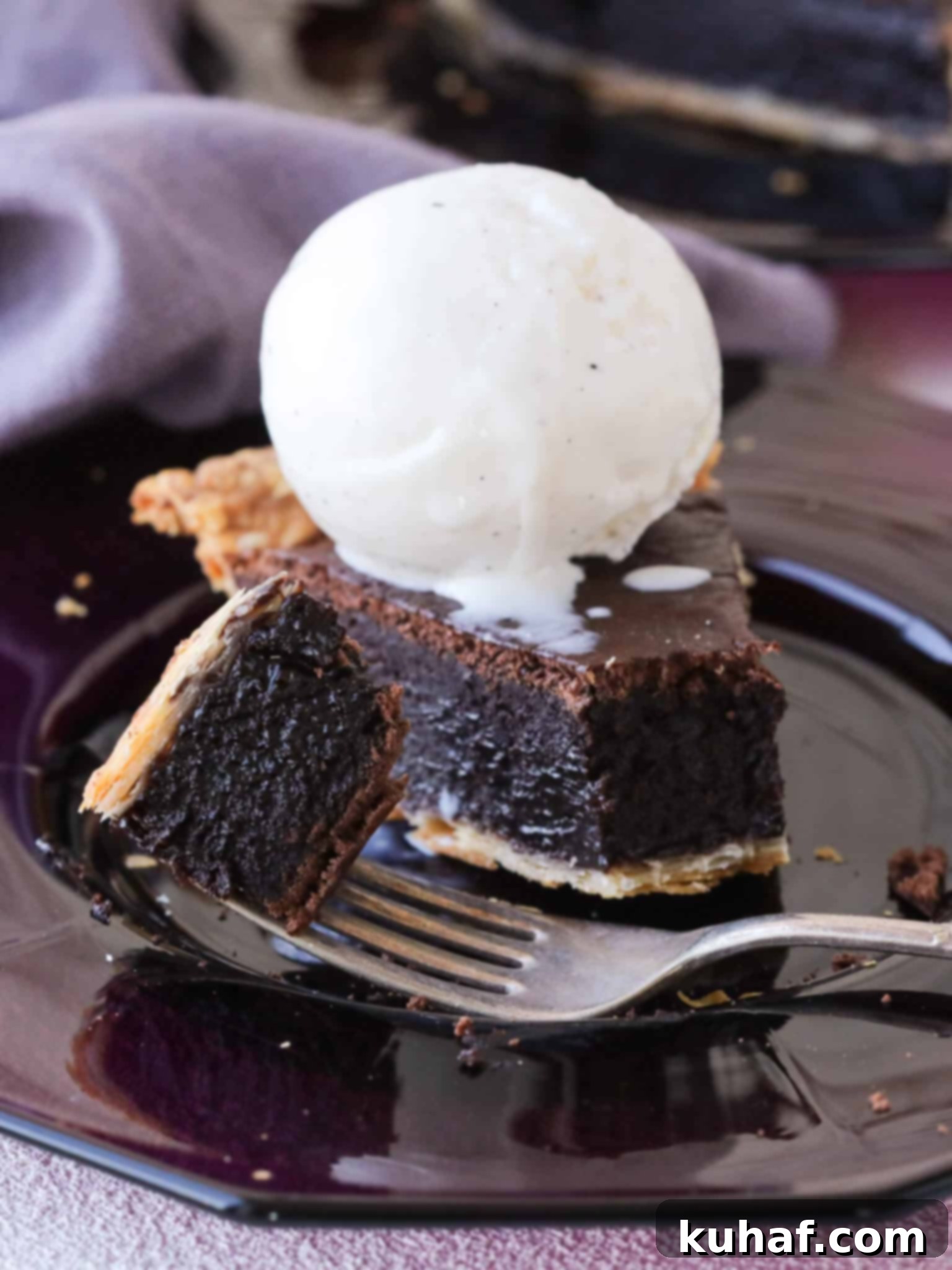 Easy chocolate pie with a scoop of vanilla ice cream, ready to serve.