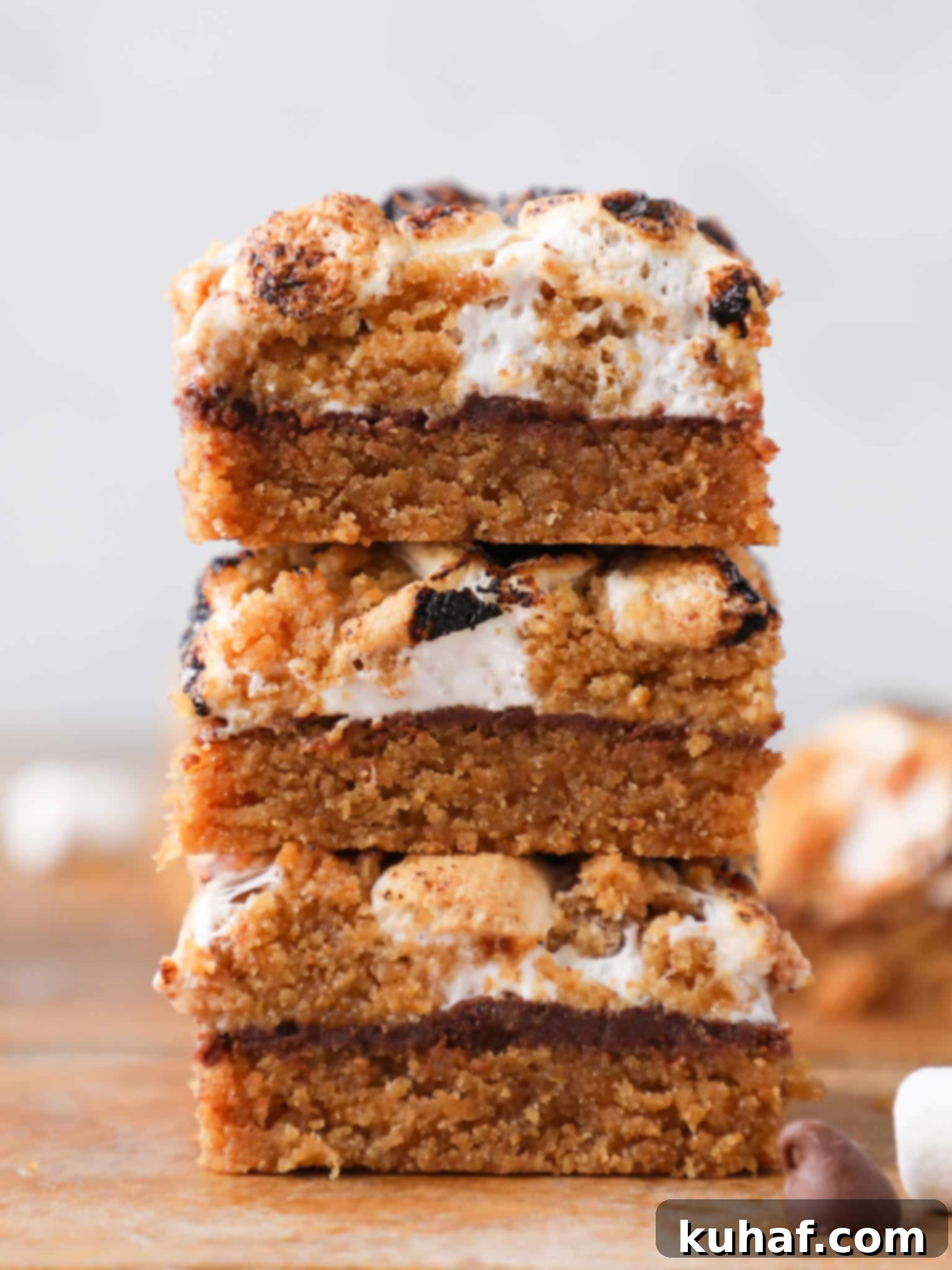 Gooey S'mores Crumble Bars 2 Stacked Soft Chewy S'mores Crumble Bars showcasing gooey layers